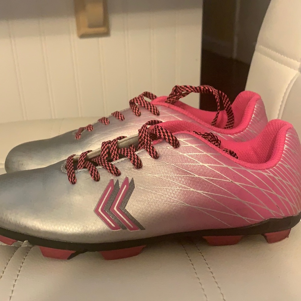 Slightly used black and pink kids cleats-can offer